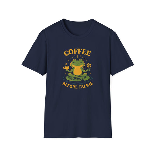 Navy color t-shirt with ’Coffee Before Talkie’ text on top and bottom of a smiley and seated frog holding a flower on her left hand and a freshly made coffee on a mug on her right hand design on a navy background