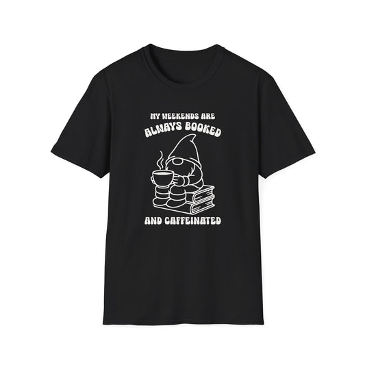 Black color t-shirt with ’My Weekends Are Always Booked And Caffeinated’ text on top and bottom of a gnome seated on top of books and holding a freshly made coffee on a mug lineal design on a black background